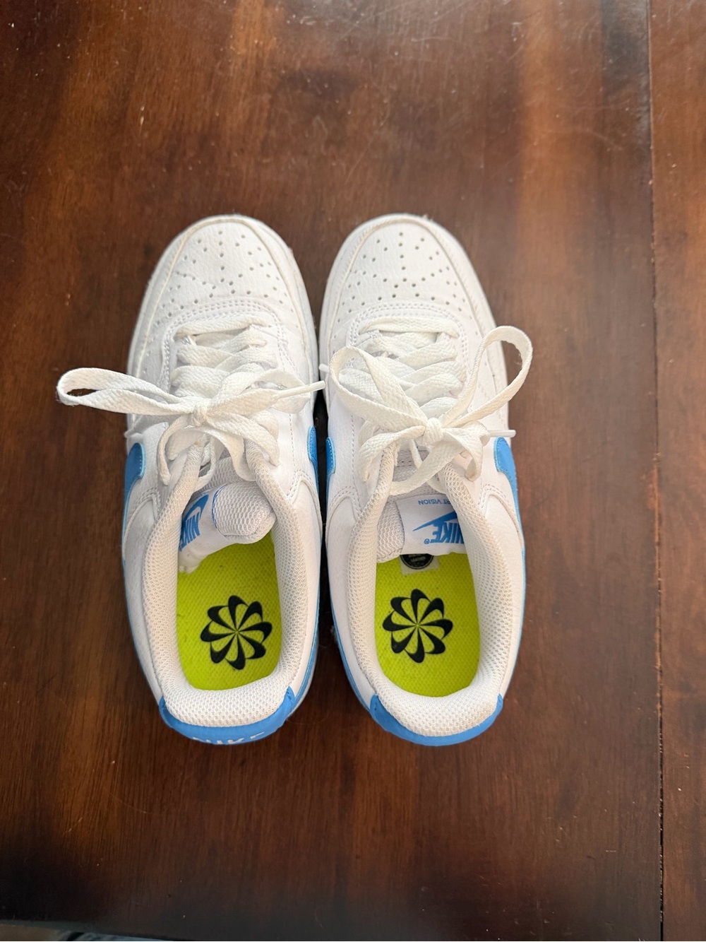 Nike White Low-Top Sneakers with Blue Accents